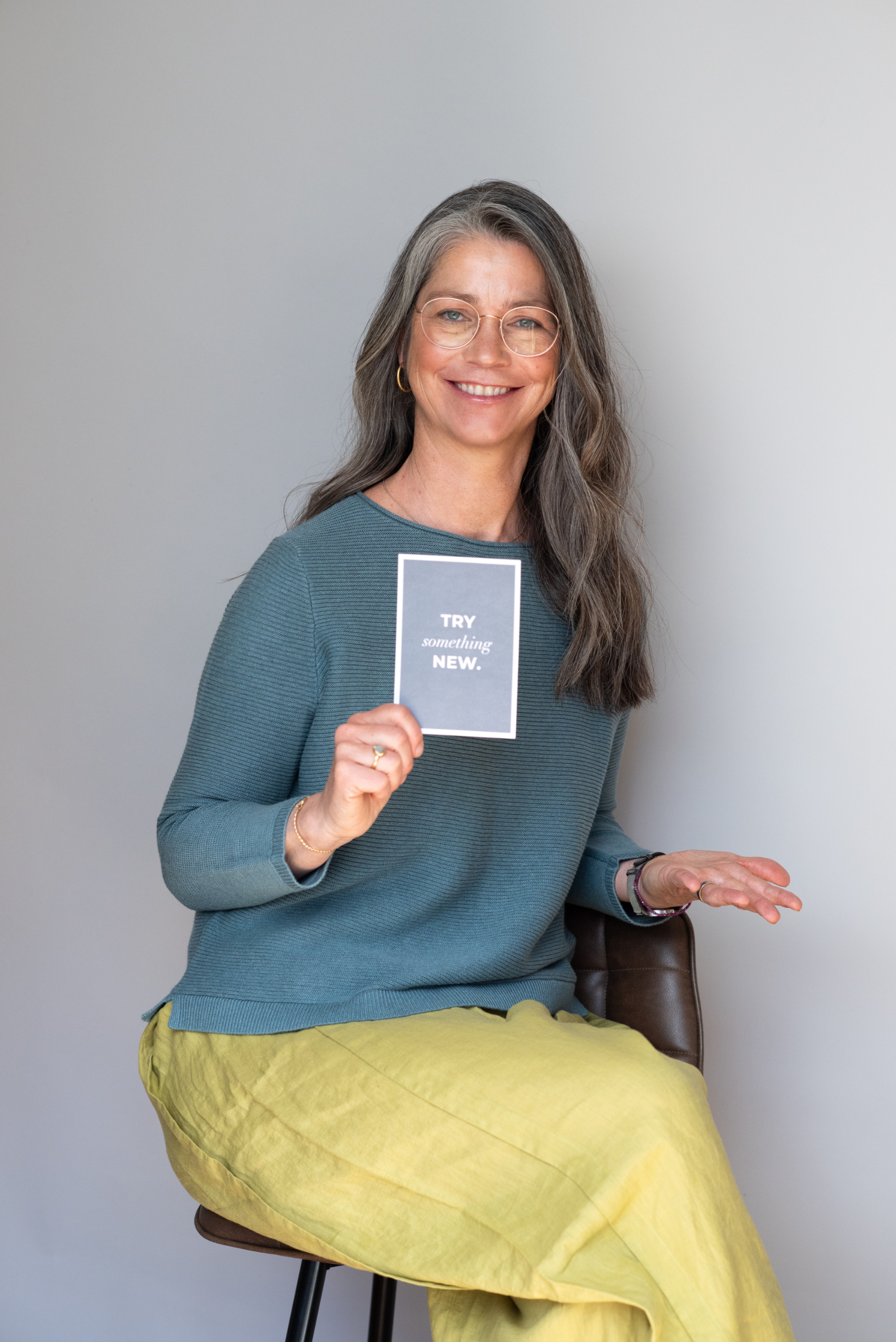 Mascha Alexandra Heck mit Karte «Try something new»